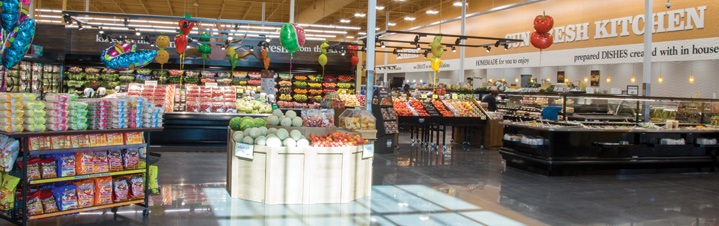 Photo of salad bar and prepared food counter.